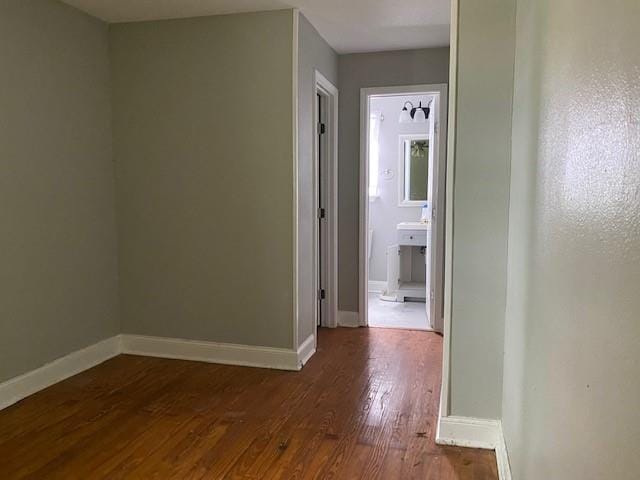 7 Labarre Pl, Jefferson, LA 70121 - hallway with dark wood-type flooring and baseboards