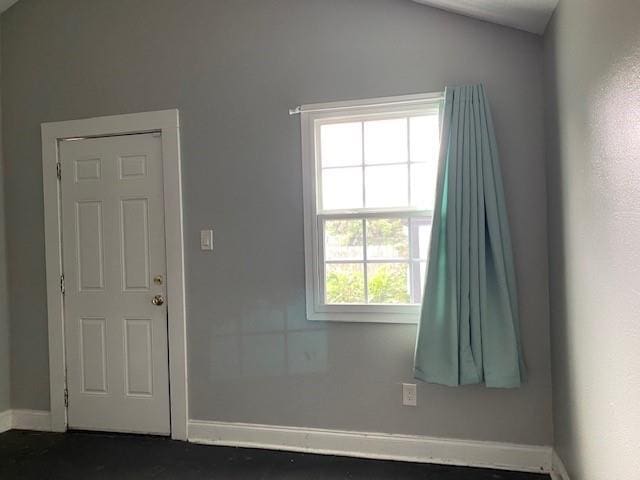 7 Labarre Pl, Jefferson, LA 70121 - empty room featuring baseboards and vaulted ceiling