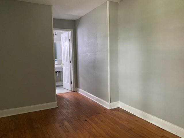 7 Labarre Pl, Jefferson, LA 70121 - spare room featuring baseboards and wood finished floors