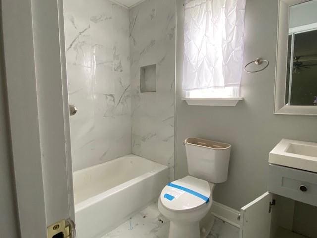 7 Labarre Pl, Jefferson, LA 70121 - full bathroom featuring vanity, marble look tile flooring, toilet, and shower / tub combination