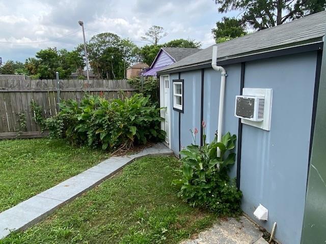 7 Labarre Pl, Jefferson, LA 70121 - view of yard with a wall mounted air conditioner