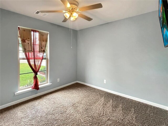 75616 Sylvia Dr, Covington, LA 70435 - empty room featuring carpet flooring, a ceiling fan, and baseboards