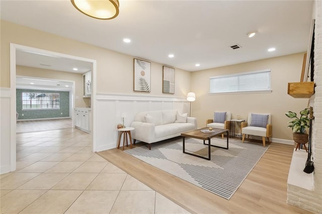 4912 Ithaca St, Metairie, LA 70006 - living room featuring plenty of natural light and light wood-style floors