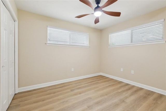 4912 Ithaca St, Metairie, LA 70006 - unfurnished bedroom with a closet, light wood finished floors, baseboards, and a ceiling fan