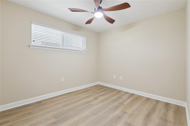 4912 Ithaca St, Metairie, LA 70006 - spare room with light wood finished floors, baseboards, and ceiling fan
