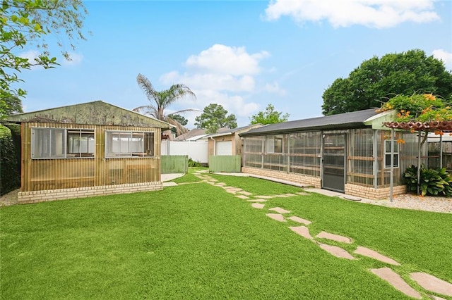 4912 Ithaca St, Metairie, LA 70006 - view of yard with an exterior structure
