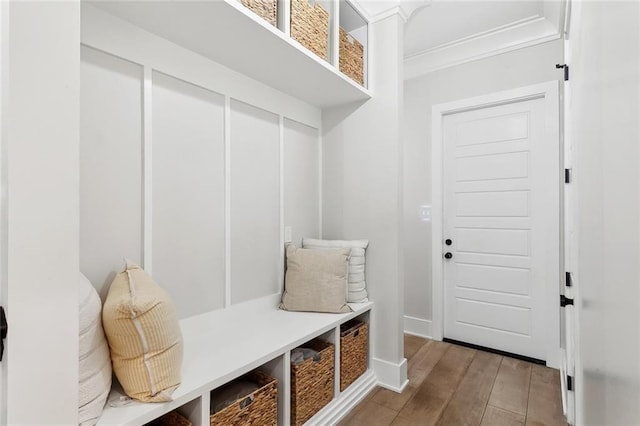 1600 Heatherwood Dr, Harvey, LA 70058 - mudroom with wood finished floors, crown molding, and baseboards