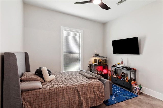 1600 Heatherwood Dr, Harvey, LA 70058 - carpeted bedroom with baseboards and ceiling fan