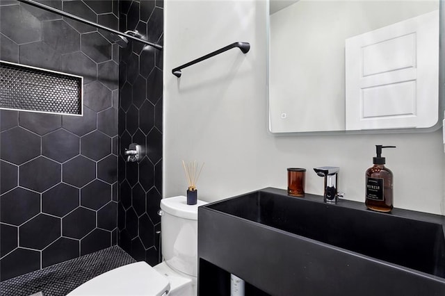 1600 Heatherwood Dr, Harvey, LA 70058 - full bathroom with a tile shower and toilet