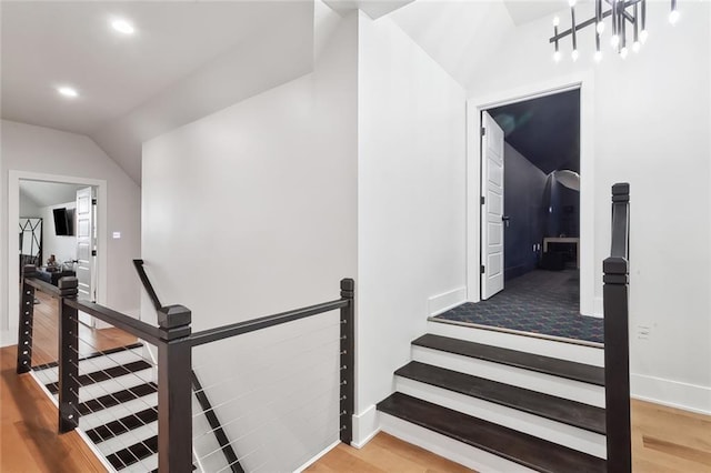 1600 Heatherwood Dr, Harvey, LA 70058 - staircase with vaulted ceiling, wood finished floors, recessed lighting, and baseboards