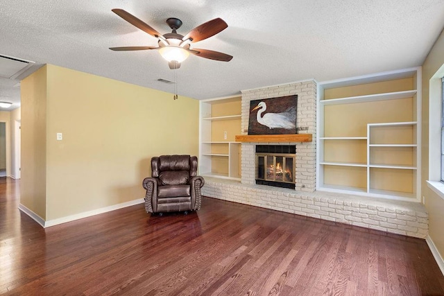 110 Willow Dr, Covington, LA 70433 - unfurnished room featuring a textured ceiling, built in features, baseboards, wood finished floors, and ceiling fan