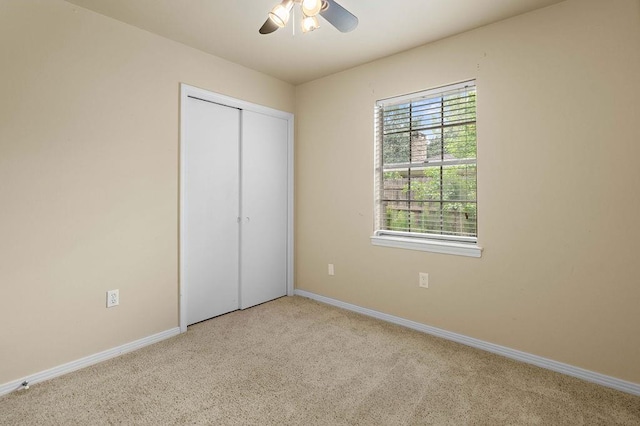 110 Willow Dr, Covington, LA 70433 - unfurnished bedroom with carpet floors, baseboards, a closet, and a ceiling fan