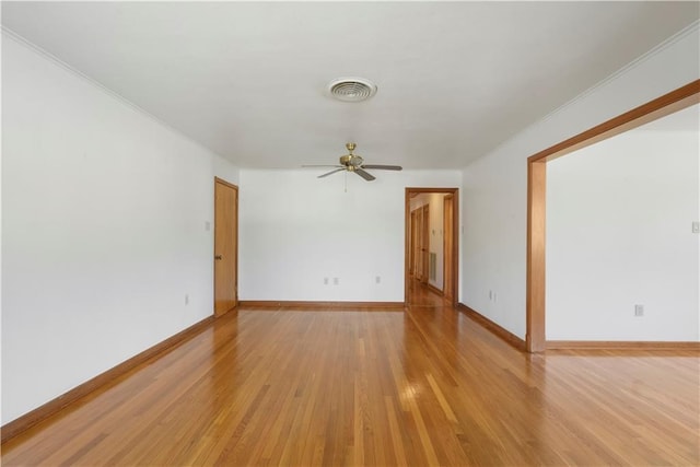 7356 Cameo St, New Orleans, LA 70124 - spare room with light wood-style floors, ceiling fan, and baseboards