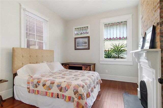 149 Millaudon St, New Orleans, LA 70118 - bedroom featuring dark wood-style floors and baseboards