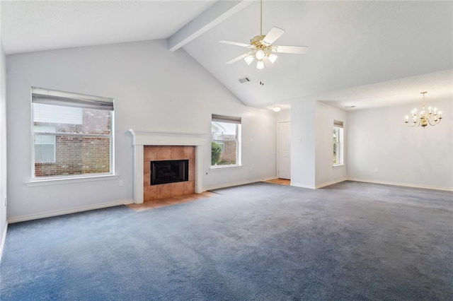 768 Wilkinson St, Mandeville, LA 70448 - unfurnished living room with a tiled fireplace, a chandelier, carpet flooring, beamed ceiling, and ceiling fan