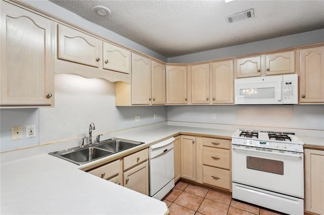 768 Wilkinson St, Mandeville, LA 70448 - kitchen with white appliances, a sink, light brown cabinets, a textured ceiling, and light countertops