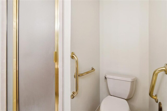 768 Wilkinson St, Mandeville, LA 70448 - bathroom featuring toilet