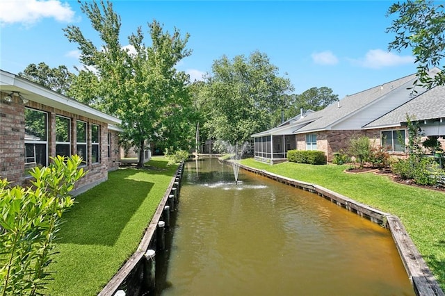 768 Wilkinson St, Mandeville, LA 70448 - view of property's community with a water view and a yard