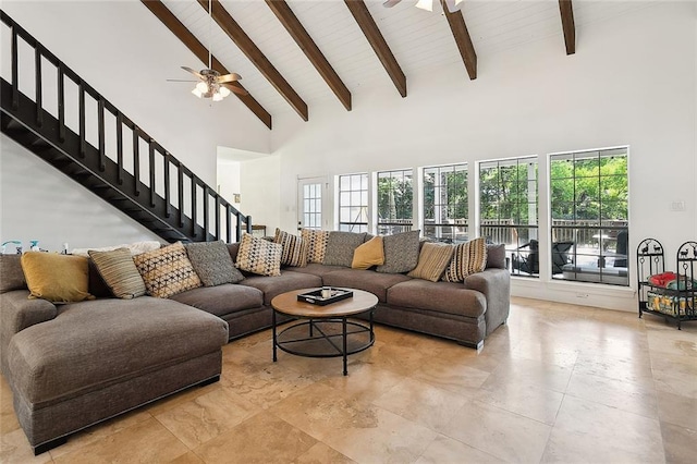 114 Kendrick Dr, Slidell, LA 70461 - living area with a ceiling fan, high vaulted ceiling, stairs, and beamed ceiling