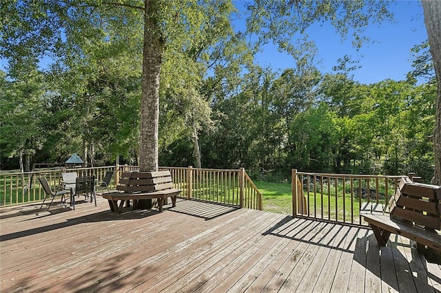 114 Kendrick Dr, Slidell, LA 70461 - wooden terrace with view of scattered trees and outdoor dining space