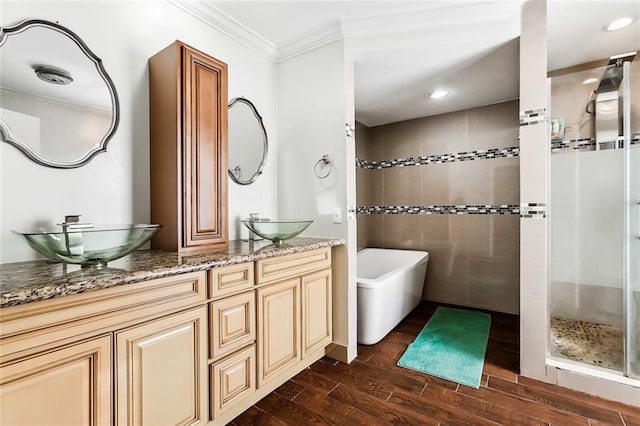 3500 Silver Maple Ct, New Orleans, LA 70131 - full bath with a stall shower, wood finished floors, crown molding, double vanity, and a freestanding tub