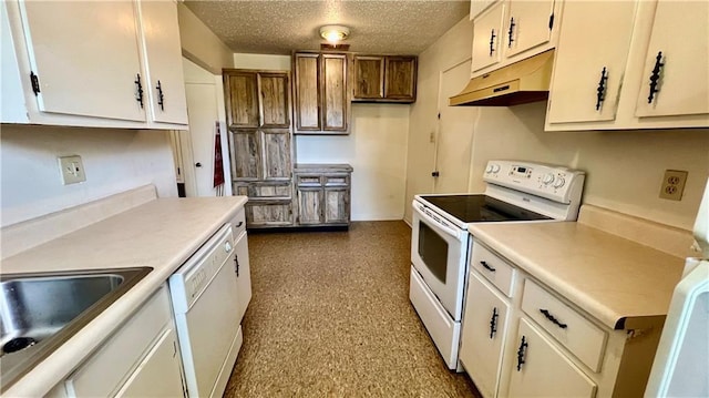 365 Cottage Ct, La Place, LA 70068 - kitchen featuring white appliances, under cabinet range hood, light countertops, a textured ceiling, and white cabinetry