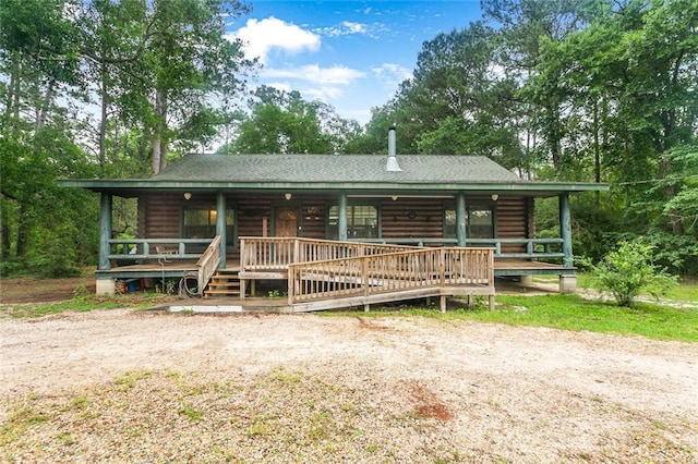 138 Ned Ave, Slidell, LA 70460 - cabin with log exterior and covered porch