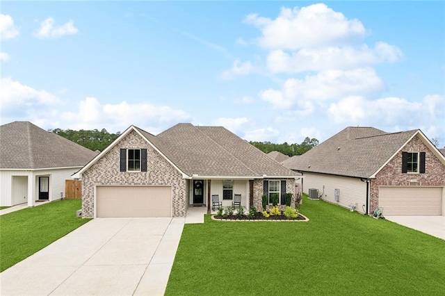11557 Woodbluff Dr, Covington, LA 70433 - view of front of property featuring concrete driveway, a front yard, brick siding, cooling unit, and a porch