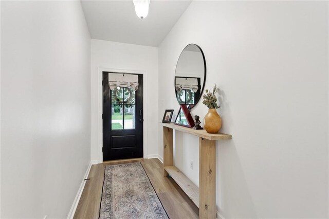 11557 Woodbluff Dr, Covington, LA 70433 - entrance foyer featuring wood finished floors and baseboards