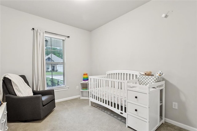 11557 Woodbluff Dr, Covington, LA 70433 - bedroom featuring carpet floors, baseboards, and a crib