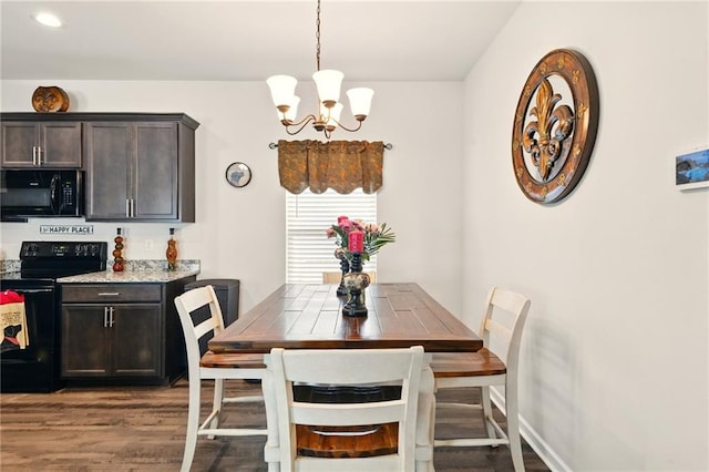 23406 Ruger Dr, Denham Springs, LA 70726 - dining space with a chandelier, dark wood-style floors, and recessed lighting