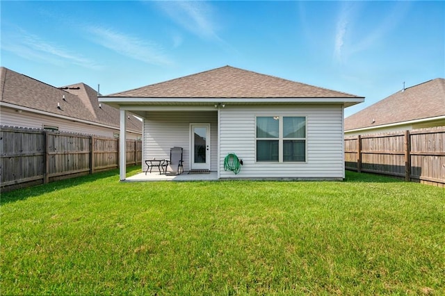 23406 Ruger Dr, Denham Springs, LA 70726 - rear view of house with a patio and roof with shingles