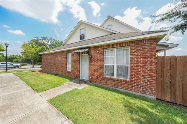 4000 Lake Beau Pre Blvd Unit 100, Baton Rouge, LA 70820 - view of front of house featuring brick siding, stucco siding, and a shingled roof