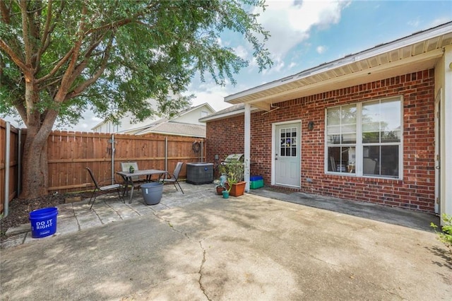 4000 Lake Beau Pre Blvd Unit 100, Baton Rouge, LA 70820 - fenced backyard with a patio, outdoor dining space, and central AC
