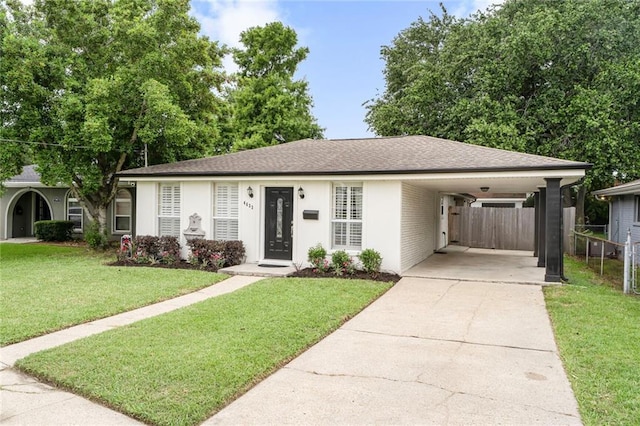 4633 Glendale St, Metairie, LA 70006 - ranch-style house featuring driveway, an attached carport, and a shingled roof