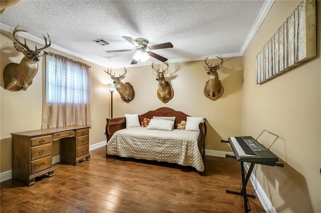 4633 Glendale St, Metairie, LA 70006 - bedroom with crown molding, a textured ceiling, dark wood-style flooring, baseboards, and a ceiling fan