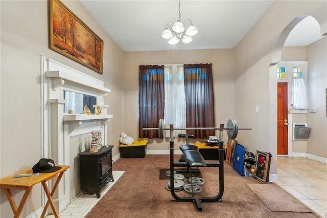 925 N Prieur St, New Orleans, LA 70116 - office space featuring arched walkways, baseboards, a chandelier, and light colored carpet
