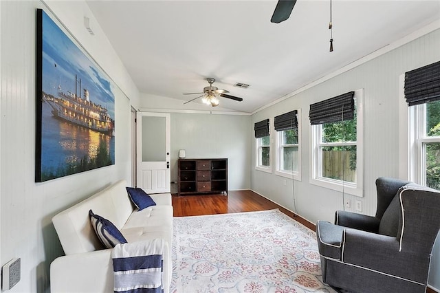 324-326 Angela St, Arabi, LA 70032 - living area with a ceiling fan, ornamental molding, and wood finished floors