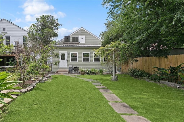 324 Angela St, Arabi, LA 70032 - back of house featuring entry steps