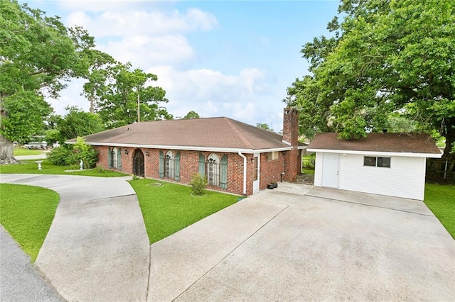 1500 Hudson St, Kenner, LA 70062 - single story home with concrete driveway, a chimney, a front lawn, and brick siding