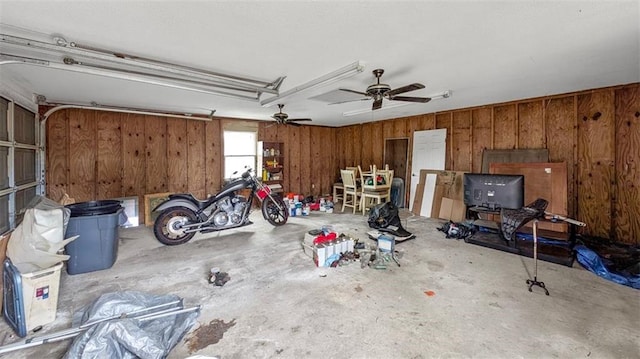 2112 Munster Blvd, Meraux, LA 70075 - garage featuring wood walls and ceiling fan