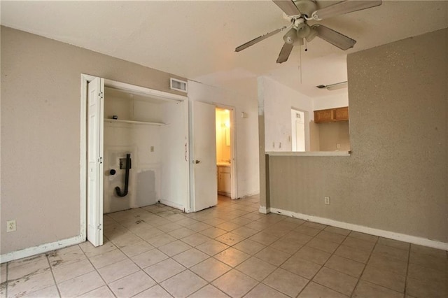 461214 Grammar Ave, Metairie, LA 70001 - empty room featuring ceiling fan, baseboards, and light tile patterned floors