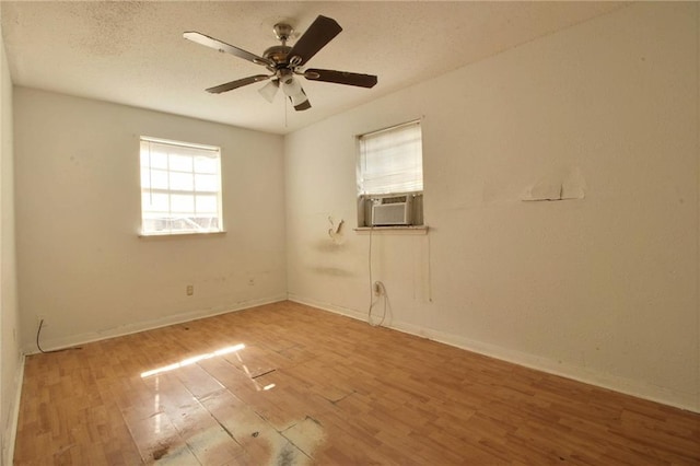 461214 Grammar Ave, Metairie, LA 70001 - unfurnished room with cooling unit, wood finished floors, ceiling fan, and baseboards