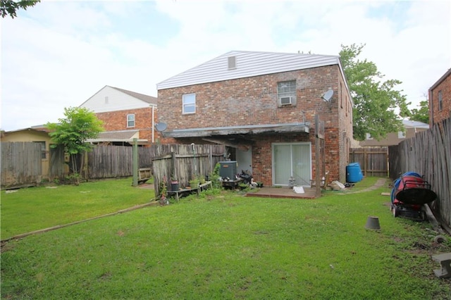461214 Grammar Ave, Metairie, LA 70001 - rear view of property featuring brick siding, central AC, and cooling unit