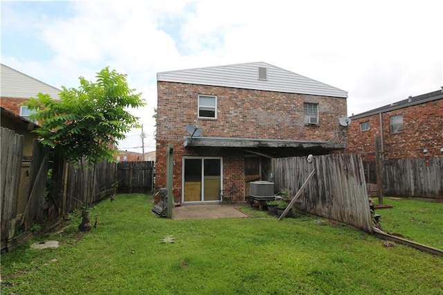 461214 Grammar Ave, Metairie, LA 70001 - back of house featuring central AC and brick siding