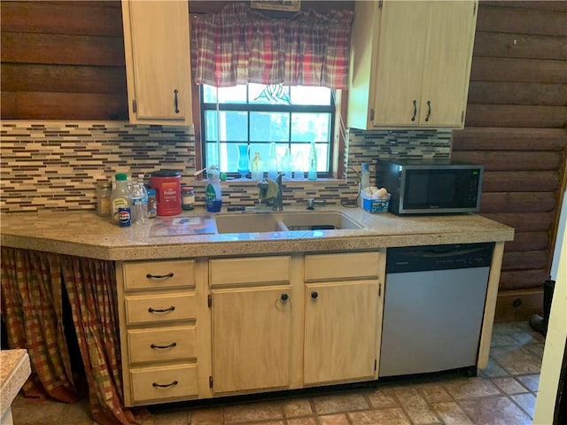 26203 Dove St, Ponchatoula, LA 70454 - kitchen with stainless steel appliances, a sink, and decorative backsplash
