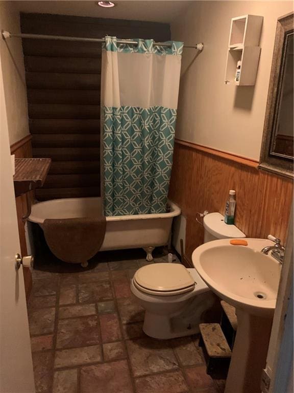 26203 Dove St, Ponchatoula, LA 70454 - full bath with wainscoting, toilet, and wooden walls