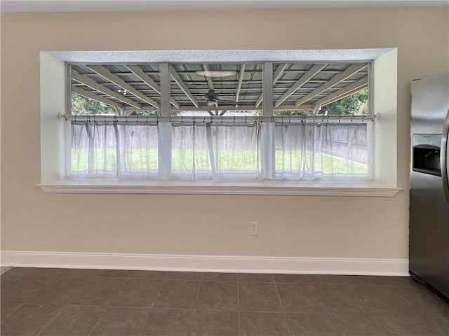 128 Hollowrock Ct, Slidell, LA 70461 - unfurnished dining area with baseboards