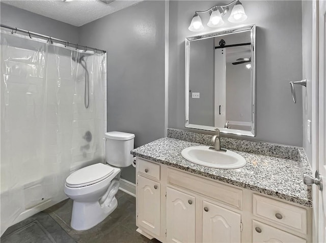 128 Hollowrock Ct, Slidell, LA 70461 - bathroom with toilet, vanity, shower / bath combo with shower curtain, a textured ceiling, and tile patterned flooring