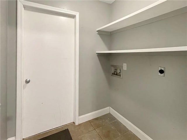 128 Hollowrock Ct, Slidell, LA 70461 - laundry room featuring hookup for a washing machine, hookup for an electric dryer, baseboards, and tile patterned flooring